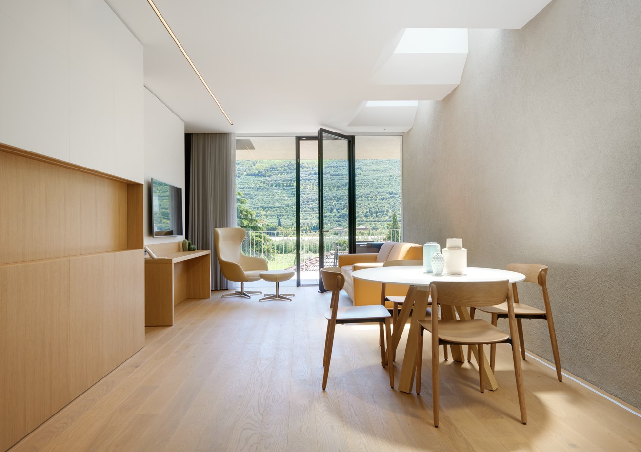 Camere albergo design: suite con pitture sanificazione hotel, garantendo un ambiente sano