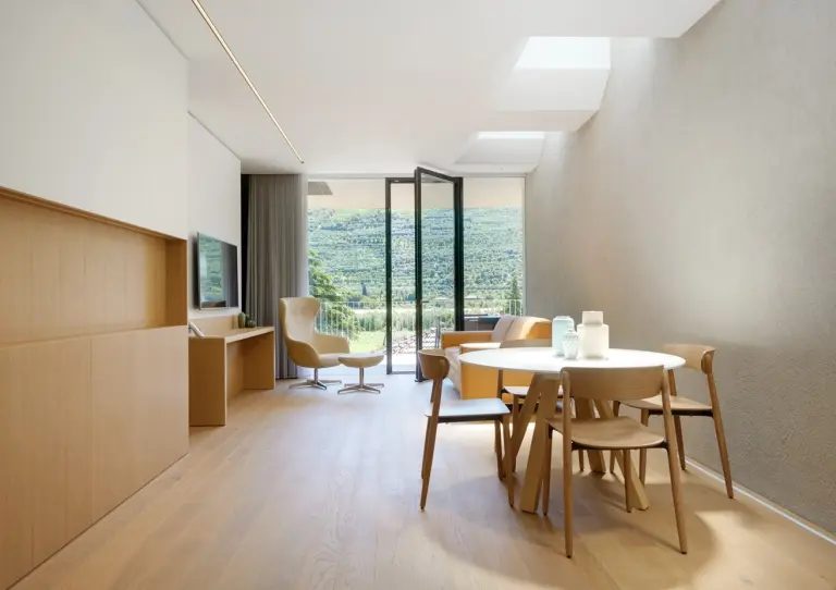 Camere albergo design: suite con pitture sanificazione hotel, garantendo un ambiente sano e confortevole.