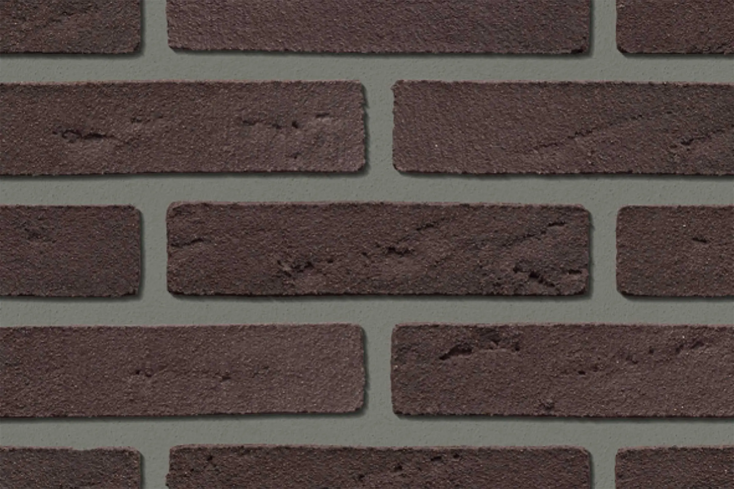 Dettaglio Rivestimento mattoncini per rivestimento esterno di resina grigio-rossi, StoCleyerB 71 130