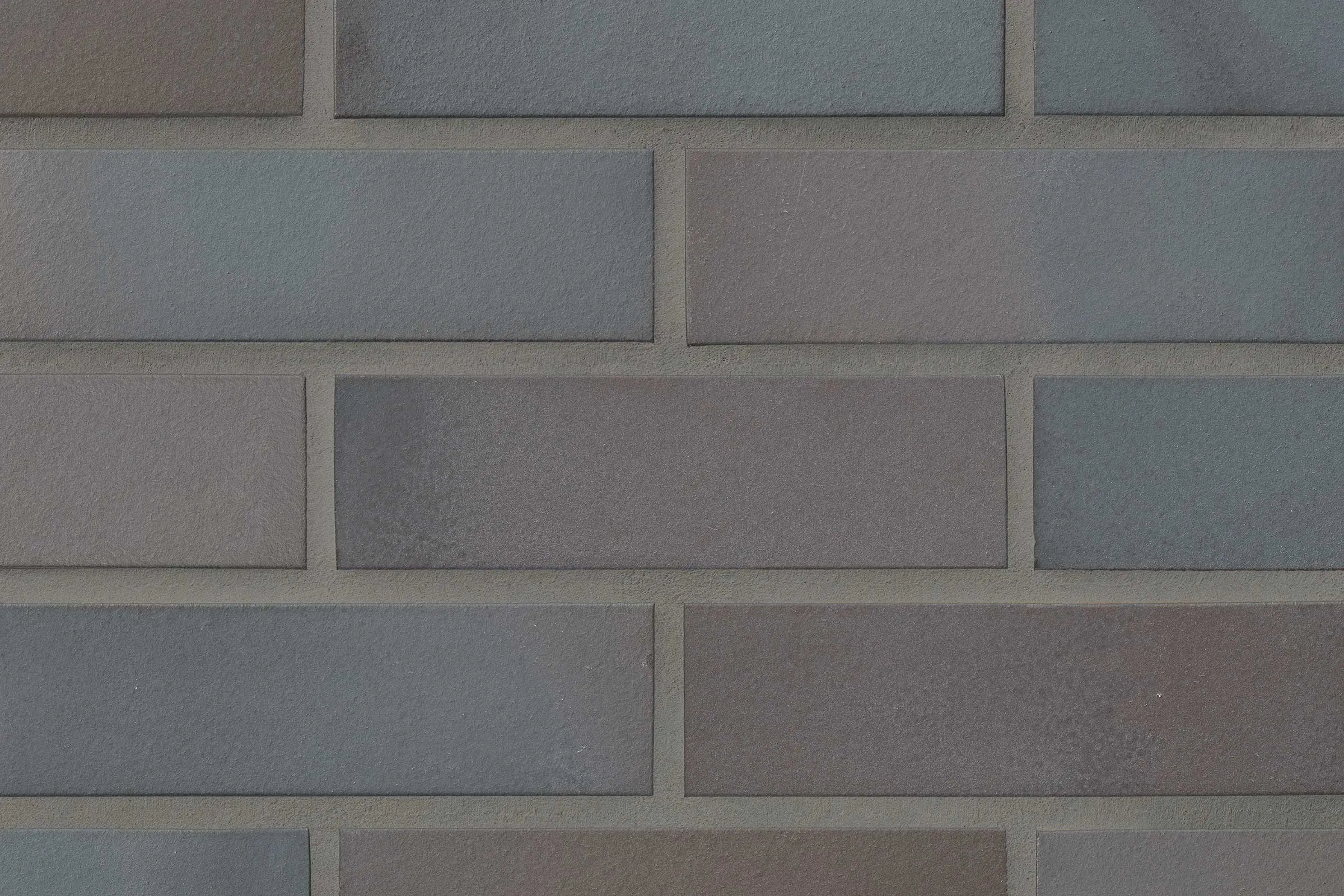 Dettaglio superficie rivestimento mattone faccia vista StoBrick 200 in tonalità Grigia sfumata